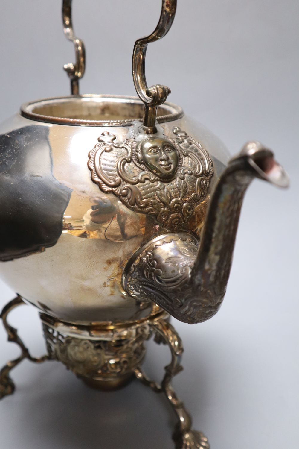 Two Victorian silver plated tea kettles each on burner stands, 34cm high